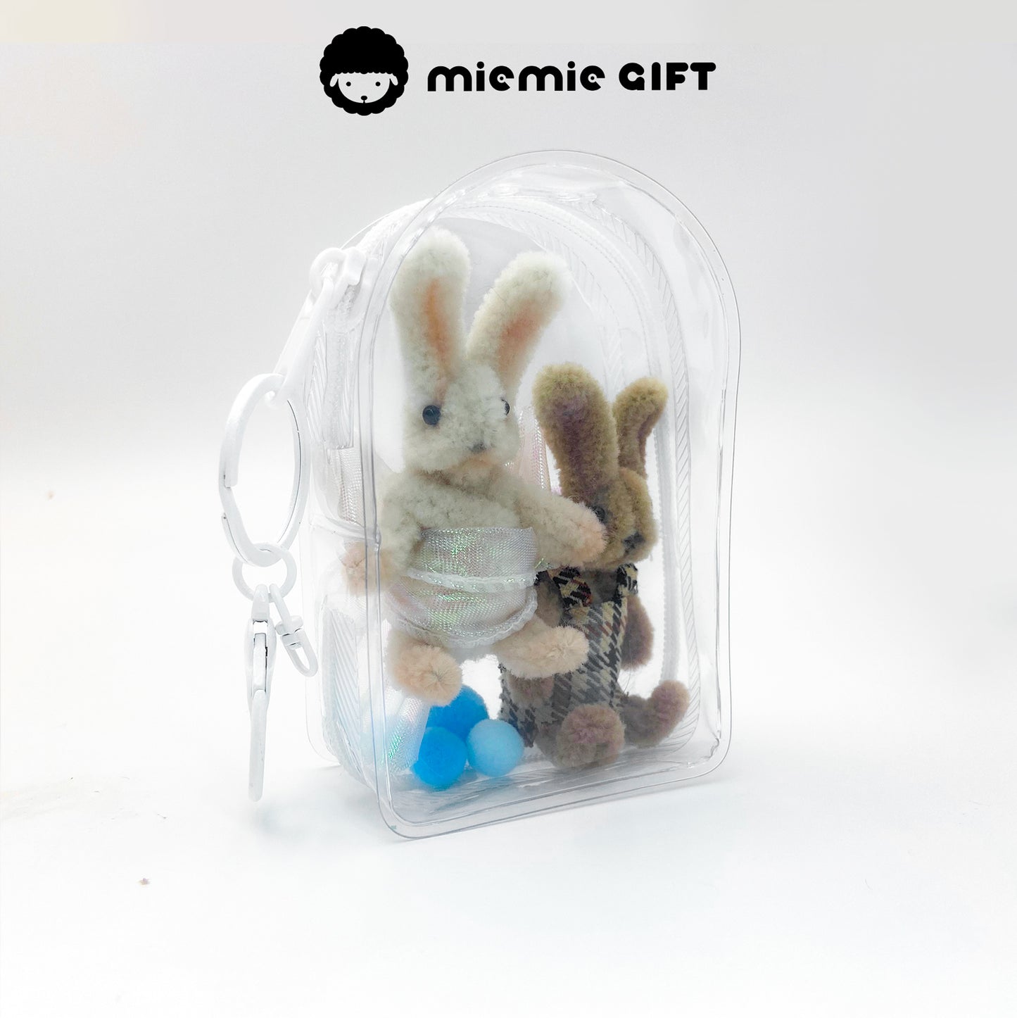 Handmade Easter Bunny Keychains in Clear Bag: Brown and white bunny keychains made with high-density wool pipe cleaners. The transparent display bag showcases these cute Easter accessories double bunny charm