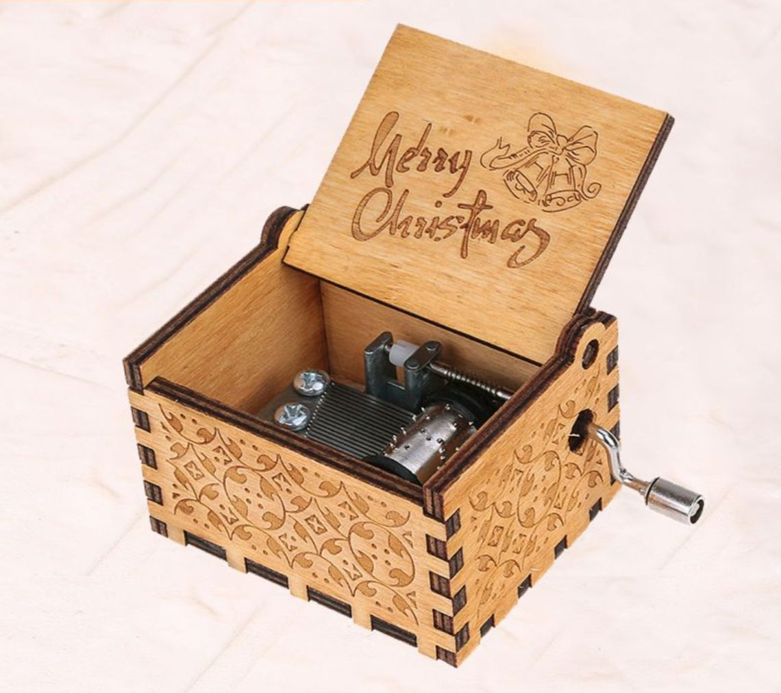 Experience the enchanting charm of our Christmas Wooden Rotating Hand-Crank Music Box, beautifully crafted to evoke nostalgia and warmth during the holiday season. Featuring a delightful design with intricate carvings and a mesmerizing rotating scene, this octave box plays a classic festive tune with a simple turn of the hand crank. Perfect as a unique gift or a festive decor piece, it will undoubtedly bring joy and a touch of magic to your Christmas celebrations.
