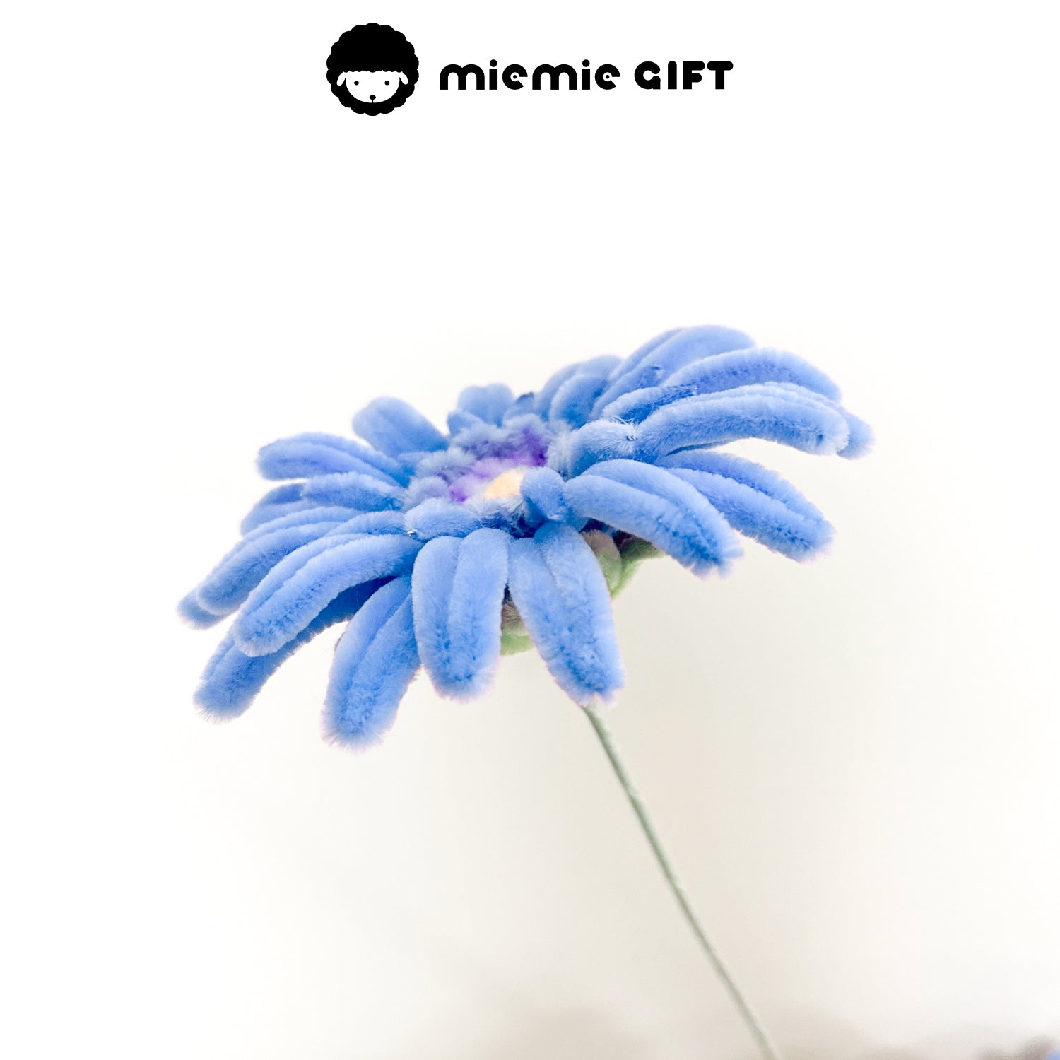 Realistic blue frangipani flower made from soft pipe cleaners, ideal for DIY floral crafts and handmade decorations.